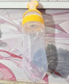 Baby Spoon Bottle Feeder (Color: Yellow)